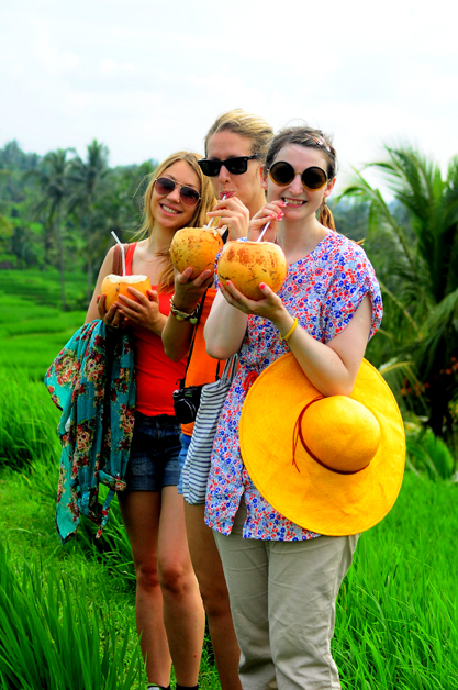 Trying fresh coconut from the garden