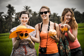 Trying fresh young coconut